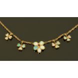 A 15 ct gold opal necklace. CONDITION REPORT: Gross weight 6 grams.