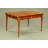 A 19th century mahogany pullout dining table,