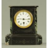 A 19th century polished black slate and green marble mantle clock, with single train movement,