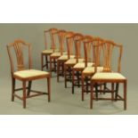 A set of eight early 19th century oak Hepplewhite style dining chairs,