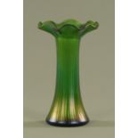 A Loetz style glass vase, with flared lip and ground pontil mark. Height 21 cm.