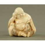 An early 20th century Chinese ivory Buddha, seated, circa 1920, with signature to base.