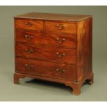 An early 19th century mahogany chest of drawers,