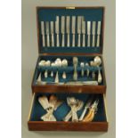 An oak canteen containing a quantity of silver plated cutlery, various types,