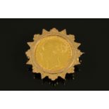 A Victorian gold sovereign 1872, in detachable brooch mount, 10.2 grams gross.
