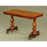 A 19th century rosewood library table, with rounded corners,