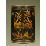 A 19th century hanging bowfronted corner cupboard, with chinoiserie decoration,