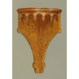 A late 19th century Arts & Crafts carved and painted corner bracket,