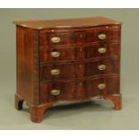 A 19th century mahogany serpentine fronted chest of drawers,