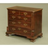 A George III style mahogany chest of drawers,