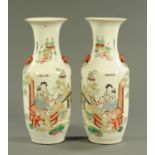 A large pair of Chinese polychrome vases, with numerous character marks and figures. Height 60 cm.