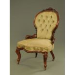 A Victorian walnut framed ladies chair,