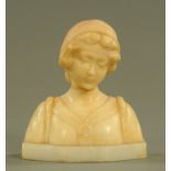 A 19th century alabaster bust, female figure wearing a bonnet. Height 17 cm, width 14 cm.