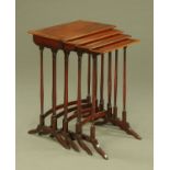 A quartetto of mahogany tables, boxwood strung and raised on simple turned legs. Widest 53 cm.