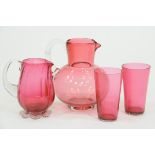 Four pieces of Cranberry glass,