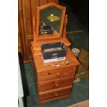 Pine three drawer bedside chest,