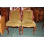 Pair of Victorian chairs upholstered in green material