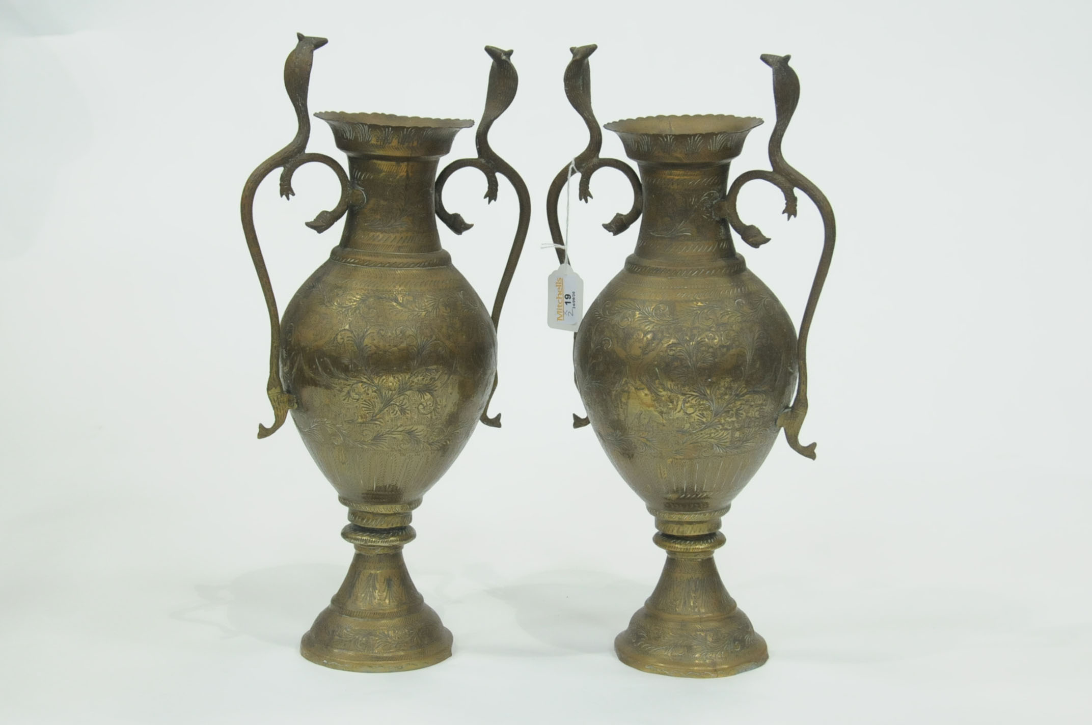 Pair of brass vases with snake handles,