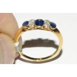 18 ct gold diamond and sapphire ring,