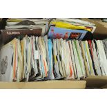 Box of record singles, to include Humphrey Lyttelton & His Band, Dire Straits, East Bound Train,