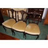 Three Edwardian dining chairs