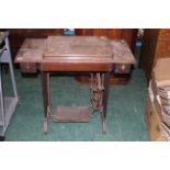 Singer treadle sewing machine table with sewing machine