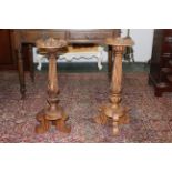 Pair of chunky carved candle stands