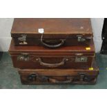 3 vintage suitcases