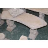 Bow shaped garden bench with squirrel supports