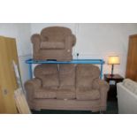 Brown floral three seater settee and armchair