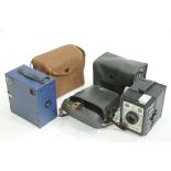 Box of vintage cameras, binoculars, etc.