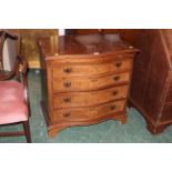 Reproduction serpentine fronted walnut and veneered chest of drawers