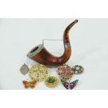 Vintage pipe and brooches