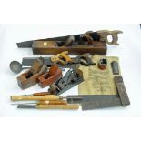 Box of tools, saws, planes, etc.