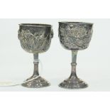 Two white metal egg cups with Chinese marks to base