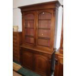 Victorian mahogany bookcase with arched glazed doors and adjustable shelves,