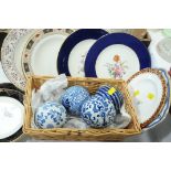 Basket of 4 carpet balls and plates, Crown Derby, etc.