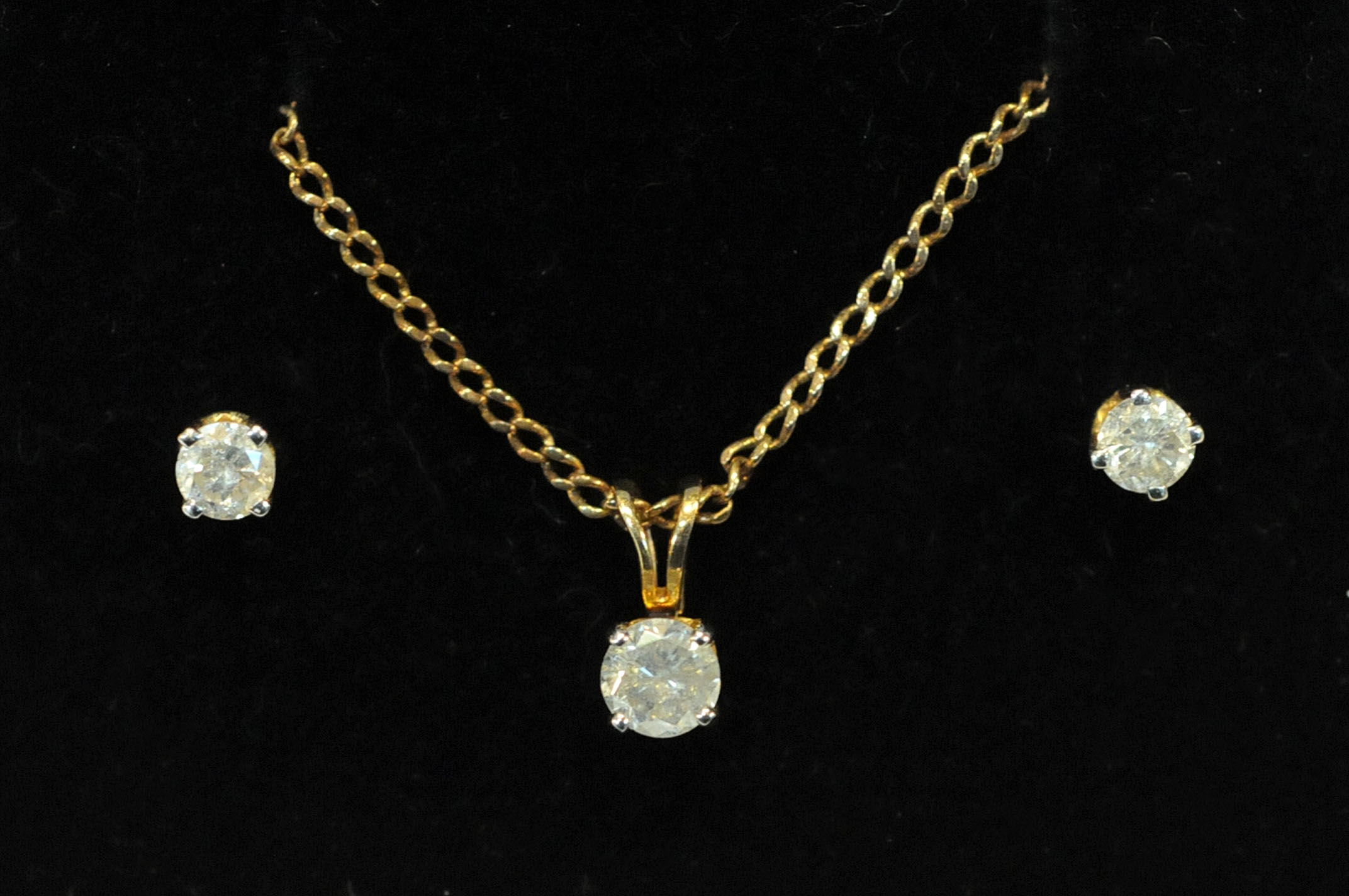 9 ct gold chain with solitaire diamond pendant and matching pair of diamond stud earrings