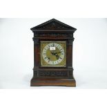Early 20th century oak cased mantle clock with brass face,