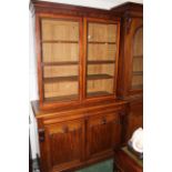 Large Victorian mahogany bookcase with rectangular glazed doors and adjustable shelves,