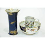 Crescent vase with gilded decoration of fish and seashells etc,