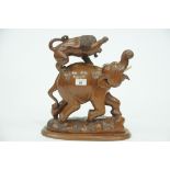 Lion on elephants back wood carving, width 30 cm,