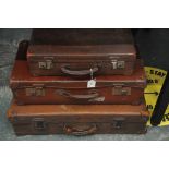 3 vintage suitcases