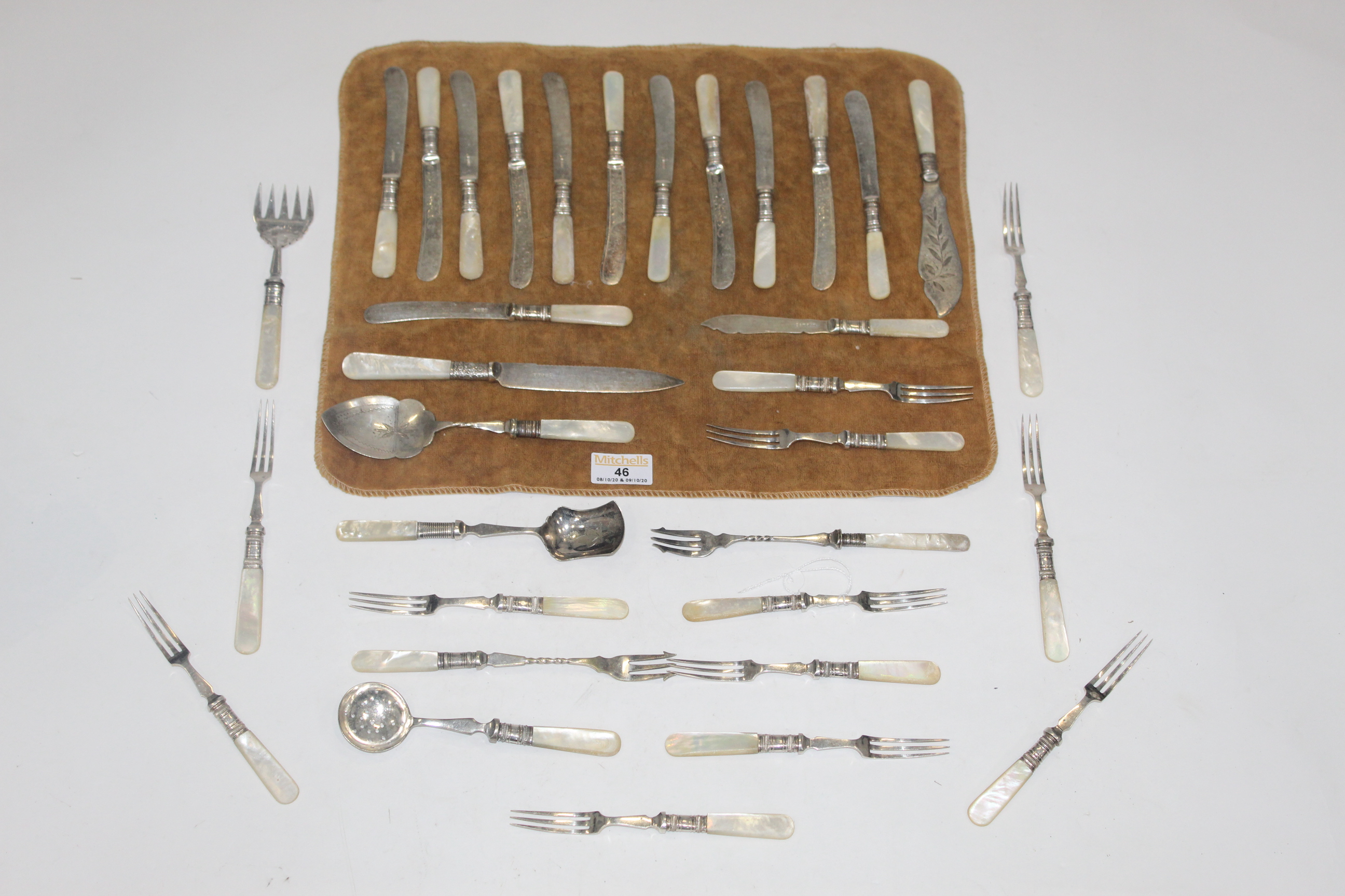 A small collection of silver plated and mother of pearl hors d'oeuvres cutlery