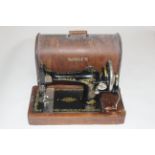 Cased Singer sewing machine