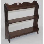 Hanging mahogany bookshelf