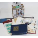 Box of stamps and stamp albums