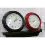 Two circular wall clocks - one Churchgate