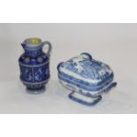 Relief moulded jug and a blue and white Davenport tureen