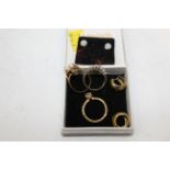 Box of yellow metal rings and earrings